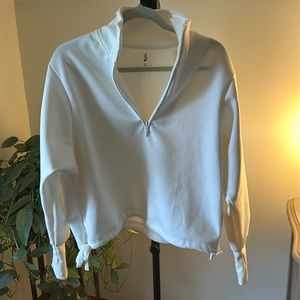 NWOT women’s cream quarter zip pull over. MTA sports